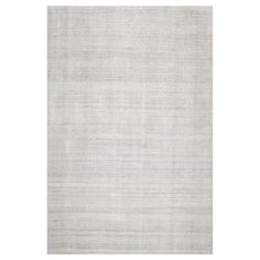 a white rug with an uneven design on the top and bottom, in grey tones