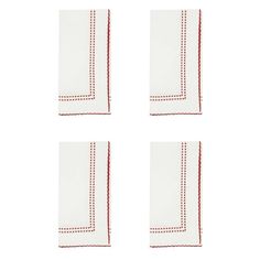 four white napkins with red stitching on them