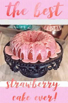 a bundt cake with pink icing sitting on top of a black plate that says the best strawberry cake ever