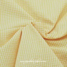 a yellow and white checkered fabric