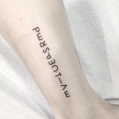 a person with a tattoo on their arm