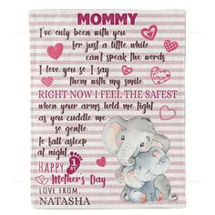 a pink and white towel with an elephant on it's side, saying mommy i love you