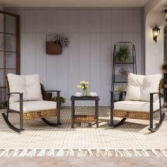 two chairs and a table on a patio