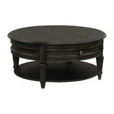 an oval coffee table with two drawers on the bottom and one drawer at the top