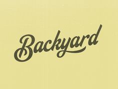 the word backyard written in cursive black ink on a yellow background with an old - fashioned font