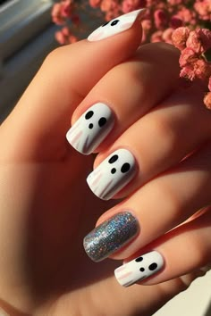 Decorating your nails for Halloween is a fun way to embrace the spooky season. This post contains 29 different Halloween nail designs you can create at home. Ideas, black, designs, art, cute, Disney, spooky, unique, simple, short, subtle, art, acrylic, almond, orange, easy Almond Shape Halloween Nails Simple, Halloween Nail Designs On Natural Nails, Rounded Halloween Nails, Simply But Cute Nails, Easy September Nails, How To Decorate Nails, Simple Black And White Halloween Nails, Easy Colorful Nail Art