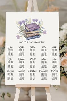 a seating chart for a book themed wedding with flowers and books on the easel