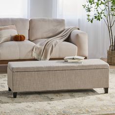 a living room scene with focus on the ottoman