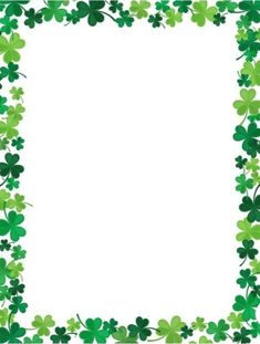 a shamrock frame with four leaf clovers on the border and white paper in the middle