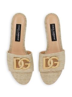 beige calf leather/goatskin/raffia gold-tone logo lettering open toe branded insole slip-on style flat soleHeel 0,3 in / 0,8 cmGender: WomenMaterial: OUTER: LAMB SKIN 60%, POLYAMIDE 40%, SOLE: CALF LEATHER 100%, LINING: GOAT SKIN 100%Color: BeigeMade in: ITProduct ID: CQ0592AR34480738*Import tax/duty will be calculated at checkout (If applicable) Raffia Sandals, Dg Logo, Women's Mules, Dolce E Gabbana, Leather Cap, Fashion Sandals, Leather Slides, Sneaker Heels, Dolce & Gabbana