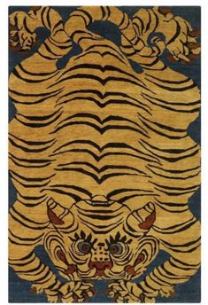 a rug with an animal design on the front and back of it's face