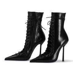 Step into retro chic with these black vintage pointed-toe booties, featuring a vamp cut design and lace-up closure. Elevate your style effortlessly with a touch of timeless sophistication. Color: Black Heel Type: Stiletto heel Heel Height: 4.72'' / 120 mm approx Product measurements were taken using size 8. Please note that measurements may vary by size. Toe: Pointed toe Vamp-cut design Lace-up design Side-zipper design Handcrafted US sizing. Fits true to size Modern Heritage, Retro Chic, Pump Sandals, Dolce & Gabbana, Lace Boots, Black Ankle Boots, Stiletto Heel, Black Heels, Lalique