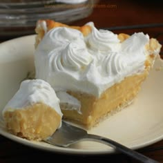 a piece of pie on a plate with a fork