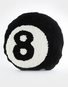 a black and white ball with the number eight on it