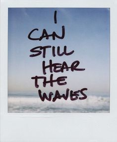 i can still hear the waves written in black ink on a polaroid camera lens