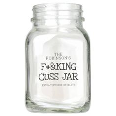 a glass jar with the words f and king cuss jar