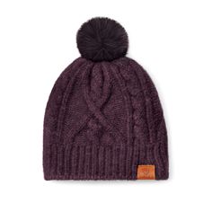 a purple cable knit hat with a pom - pom