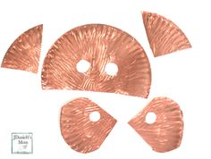 three pieces of copper foil with holes in the middle and one piece cut out to look like