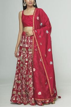 Red kalidar lehenga with thread and dabka embroidered floral motifs. Comes with floral embroidered blouse and embroidered dupatta.
Components: 3
Fabric: Silk Chanderi
Neckline: Round
Sleeve Length: Sleeveless
Color: Red
Embroidery
Inner layer with gold lace hem
Low back with tie up and tassels
Dupatta with tasseled hem
Lining: Cotton
Closure:
Lehenga: Side zip with drawstring and tassels - Aza Fashions Tassels Dupatta, Chanderi Lehenga, Red Embroidery, Gold Lace, Lace Hem, Red Silk, Indian Design, Embroidered Blouse, Set For Women