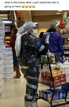 a man in a plastic suit is pushing a shopping cart