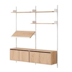 a white and wood shelf with two shelves on each side, one is open to the other