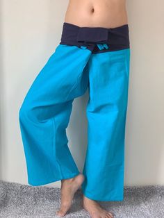 "Unisex Thai fisherman pants. One size fits all. You can wear in many occasions, casual wear, yoga wear, maternity wear, relax at home, travel etc. If you are looking for some pants that you can wear everywhere, comfortable, relax and Easy to wear. Thai fisherman pants is Answer!! Nice gift for yourself or your lover One pocket on the side for storing your items such as wallets, mobile phones, etc Approx. Measurements: One size can fits most and 1 Pockets Measurement Waist 27\" (69 cms) Length 4 Blue Harem Pants With Relaxed Fit And Straight Leg, Blue Relaxed Fit Straight Leg Harem Pants, Blue Casual Bottoms, Blue Relaxed Fit Harem Pants For Beach, Comfortable Blue Pants For Relaxation, Blue Cotton Bottoms For Relaxation, Comfortable Blue Cotton Pants, Blue Cotton Wide Leg Pants, Blue Full-length Wide Leg Cotton Pants