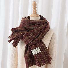 Long rectangular plaid scarf in cozy plaid colors to go with all your autumnal looks. 75" length x 26" width Casual Plaid Scarves For Cold Weather, Cotton Shawl Scarves For Fall, Plaid Scarves For Cold Weather In Winter, Brown Cotton Scarves For Fall, Brown Casual Scarves For Cold Weather, Trendy Brown Scarves For Fall, Trendy Brown Fall Scarves, Casual Cotton Scarves For Fall, Casual Brown Scarves For Cold Weather