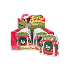 christmas dinnerware set with green and red sweaters, santa's face on the front