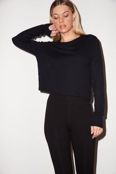 Classic fitting long sleeve top Model is 5'8" and wearing a size small Material: 95% Rayon, 5% Spandex Recommended Care: Machine wash on gentle cycle and tumble dry low Zipper Leggings, High Rise Style, Sweaters Hoodies, Bathing Suit Bottoms, High Rise Leggings, Black Rib, Zipper Detail, Black Leggings, Men Short Sleeve