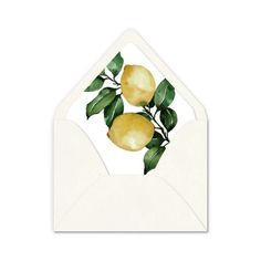 a white envelope with lemons and green leaves on it