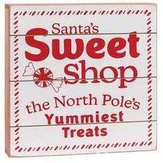 a sign that says santa's sweet shop the north pole yumfest treats