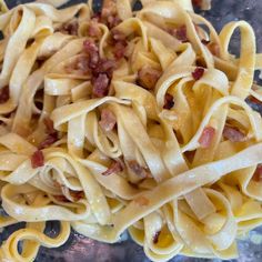 pasta with bacon and cheese on a plate