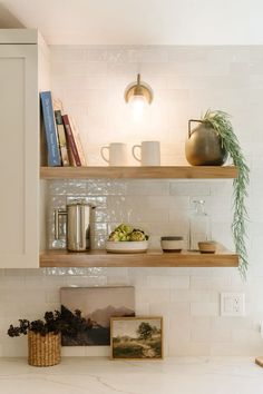 the kitchen counter is clean and ready to be used as a shelf for cooking utensils