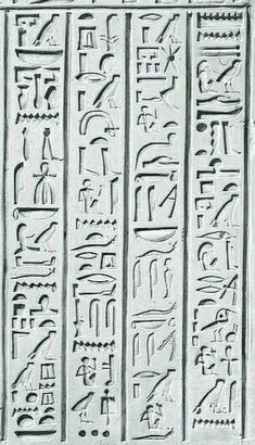 an egyptian hieroglyphic with writing on the front and side panels, all written in cursive fonts