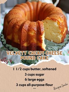 a cake that has been cut in half and is on a plate with the words velvet cream cheese pound cake