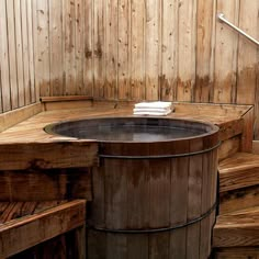 a hot tub in a wooden sauna