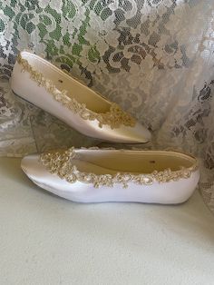 These shoes' are trimmed with a beautiful hand embroidered Champagne/gold embroidered color lace appliqués: have sequins and champagne color pearls, there's a gold threading that enhances this elegant shoes. Inner sole is soft man-made material, outer sole is leather. To buy color swatches: www.etsy.com/swatches/129787069/buy-color-swatch-samples-or-buy-lace FINAL SALE! THESE SHOES DESIGNS ARE NOT MASS PRODUCED THEY ARE HAND EMBELISHED AND HAND DYED TO ORDER THEREFORE, SHOES CAN NOT BE RETURNED Elegant Embellished Ballet Flats For Formal Occasions, Elegant Lace Wedding Shoes, Elegant Wedding Shoes With Lace Work, Elegant Almond Toe Ballet Flats For Wedding, Elegant Wedding Ballet Flats With Round Toe, Elegant Gold Ballet Flats For Formal Occasions, Elegant Round Toe Ballet Flats For Wedding, Elegant Pointed Toe Ballet Flats For Wedding, Gold Pointed Toe Ballet Flats For Evening