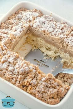 a close up of a cake in a pan with a fork sticking out of it