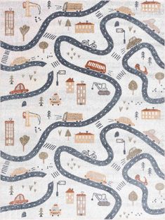 a rug with a road and buildings on it