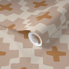 a close up view of a wallpaper with brown and white designs on it's surface