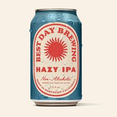 a blue and red beer can with the word best day brewing hazy ipa on it