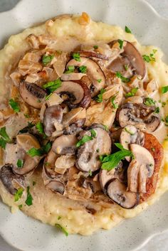 mashed potatoes topped with mushrooms and parsley