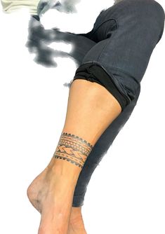 a woman's leg with a tattoo on it