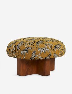 Upholstered round ottoman with darker wood base and burnt golden orange tiger print fabric. Burled Wood Furniture, Sarah Sherman, Sarah Sherman Samuel, Bright Living Room, Ottoman Design, Lulu And Georgia, Ottoman Stool, Foot Stool, Outdoor Furniture Collections