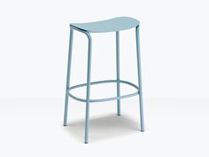 a blue stool sitting on top of a white floor