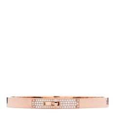 This is an authentic HERMES 18K Rose Gold Diamond PM Kelly Pave Bracelet size SH. The bracelet is crafted of 18 karat rose gold and features the signature Kelly turn-lock clasp pave-set with round brilliant cut diamonds, approximately .33 total carat weight. Pink Hermes, Hermes Bracelet, Pave Bracelet, Hermes Jewelry, Rose Gold Bracelet, Rose Gold Diamonds, Round Brilliant Cut Diamond, Brilliant Cut Diamond, Bracelet Sizes