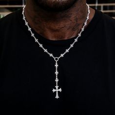 Introducing the Flared Cross Rosary Chain- a modern twist on a classic style. This 14k White Gold piece features intricate flared gothic crosses along an iced out rosary chain embedded with hand-set stones. Perfect for anyone who wants to stand out in the crowd, this rosary will immediately have all eyes on you. This product is guaranteed for life - GLD will repair the item should you experience any defects in craftsmanship or breakage. Specifications - Length: 18-20" Adjustable - Width: 8mm - W