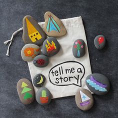 an image of some rocks with writing on them and the words tell me a story