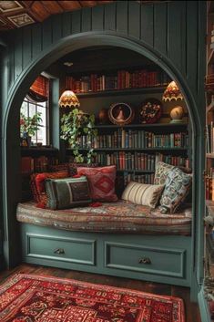 a room filled with lots of books and furniture