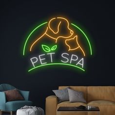 a neon sign that says pet spa in front of a couch with a dog on it